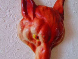 A Porcelain Fox Mask Wall Hanging.